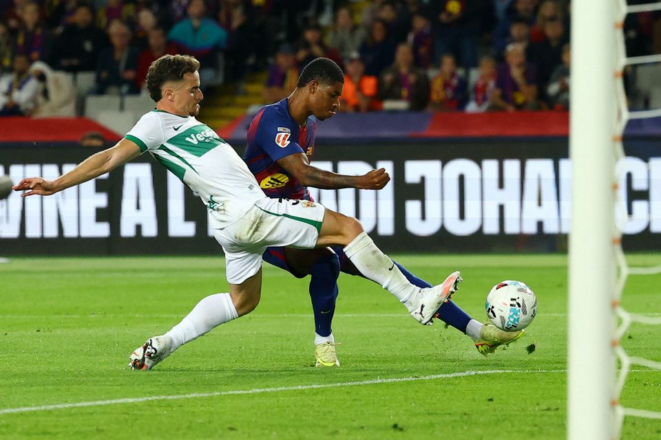Barcelona's Marcus Rashford scores their third goal in the LaLiga win over Elche at Estadi Olimpic Lluis Companys, Barcelona